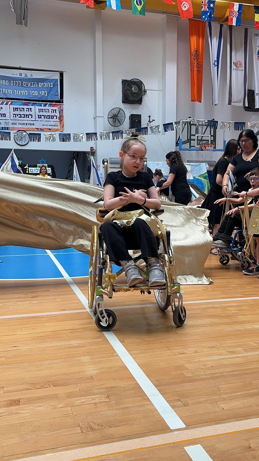 A wheelchair becomes part of the dance